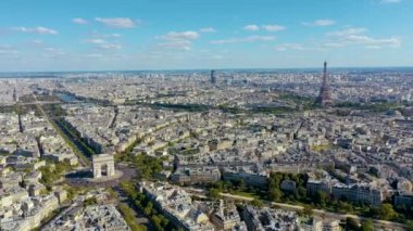 PARIS, FRANCE - MAY, 2019: Aerial drone view of Triumphal Arch and and Eiffel tower in historical city centre.