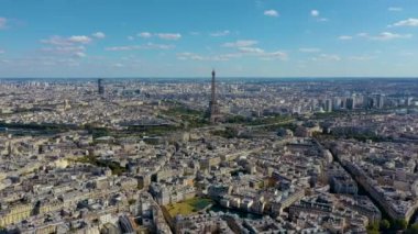 PARIS, FRANCE - MAY, 2019: Aerial drone view of Eiffel tower and historical city centre from above.