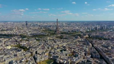PARIS, FRANCE - MAY, 2019: Aerial drone view of Eiffel tower and historical city centre from above.