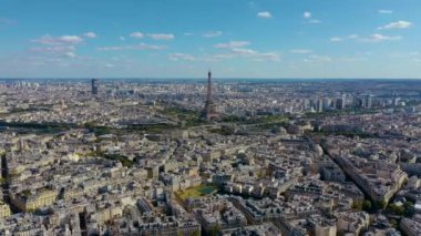 PARIS, FRANCE - MAY, 2019: Aerial drone view of Eiffel tower and historical city centre from above.