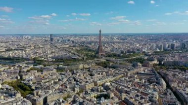 PARIS, FRANCE - MAY, 2019: Aerial drone view of Eiffel tower and historical city centre from above.