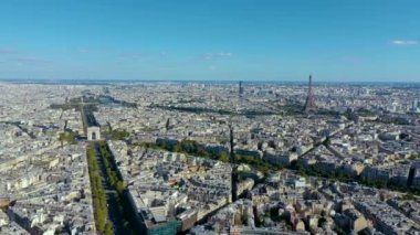 PARIS, FRANCE - MAY, 2019: Aerial drone view of Eiffel tower and historical city centre from above.