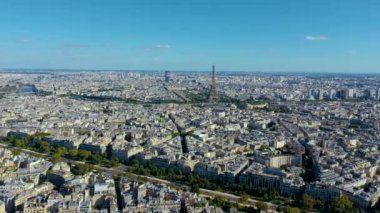 PARIS, FRANCE - MAY, 2019: Aerial drone view of Triumphal Arch and and Eiffel tower in historical city centre.