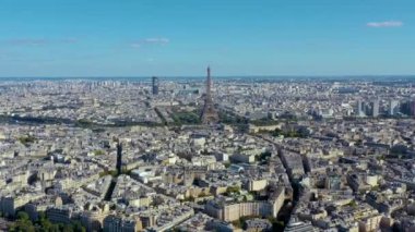 PARIS, FRANCE - MAY, 2019: Aerial drone view of Triumphal Arch and and Eiffel tower in historical city centre.