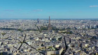 PARIS, FRANCE - MAY, 2019: Aerial drone view of Triumphal Arch and and Eiffel tower in historical city centre.