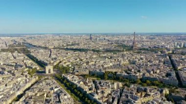 PARIS, FRANCE - MAY, 2019: Aerial drone view of Triumphal Arch and and Eiffel tower in historical city centre.
