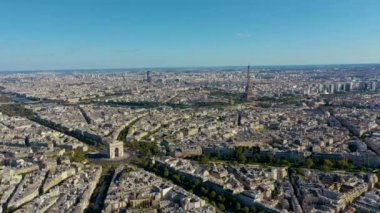 PARIS, FRANCE - MAY, 2019: Aerial drone view of Triumphal Arch and and Eiffel tower in historical city centre.