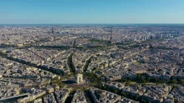 PARIS, FRANCE - MAY, 2019: Aerial drone view of Triumphal Arch and and Eiffel tower in historical city centre.