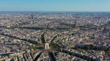 PARIS, FRANCE - MAY, 2019: Aerial drone view of Triumphal Arch and and Eiffel tower in historical city centre.