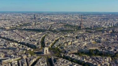 PARIS, FRANCE - MAY, 2019: Aerial drone view of Triumphal Arch and and Eiffel tower in historical city centre.