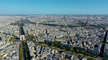 PARIS, FRANCE - MAY, 2019: Aerial drone view of Triumphal Arch and and Eiffel tower in historical city centre.