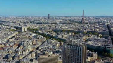 PARIS, FRANCE - MAY, 2019: Aerial drone view of Triumphal Arch and and Eiffel tower in historical city centre.