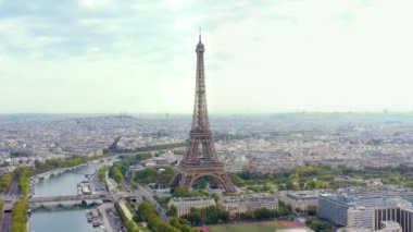 PARIS, FRANCE - MAY, 2019: Aerial drone view of Eiffel tower and historical city centre from above.