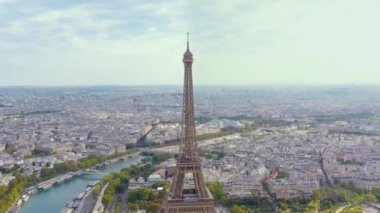 PARIS, FRANCE - MAY, 2019: Aerial drone view of Eiffel tower and historical city centre from above.