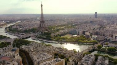 PARIS, FRANCE - MAY, 2019: Aerial drone view of Eiffel tower and Seine river in historical city centre from above.
