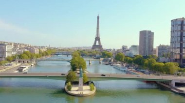 PARIS, FRANCE - MAY, 2019: Aerial drone view of Eiffel tower and Seine river in historical city centre from above.