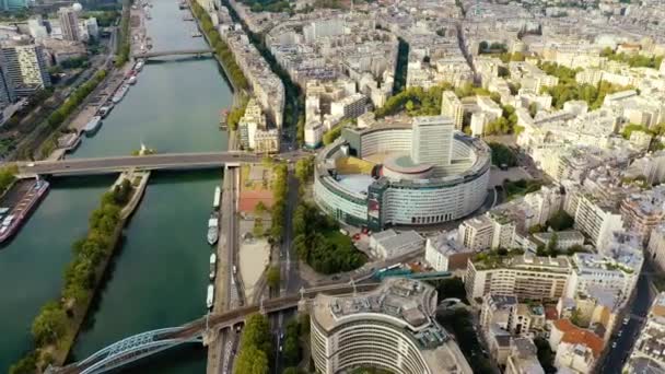 PARIS, FRANCE - MAY, 2019: Aerial drone view of the moder architecture district on Seine riverside in city centre. — Wideo stockowe