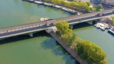 PARIS, FRANCE - MAY, 2019: Aerial drone view of the Seine riverside with bridges.
