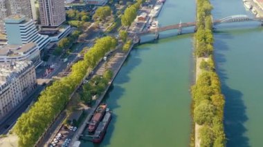 PARIS, FRANCE - MAY, 2019: Aerial drone view of the Seine riverside with bridges.