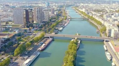 PARIS, FRANCE - MAY, 2019: Aerial drone view of the modern architecture district on Seine riverside in city centre.