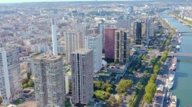 PARIS, FRANCE - MAY, 2019: Aerial drone view of the modern architecture district on Seine riverside in city centre.