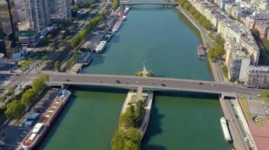 PARIS, FRANCE - MAY, 2019: Aerial drone view of the Seine riverside with bridges.
