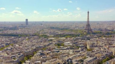 PARIS, FRANCE - MAY, 2019: Aerial drone view of Eiffel tower and historical city centre from above.