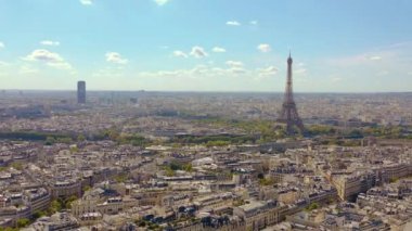 PARIS, FRANCE - MAY, 2019: Aerial drone view of Eiffel tower and historical city centre from above.
