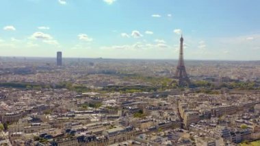 PARIS, FRANCE - MAY, 2019: Aerial drone view of Eiffel tower and historical city centre from above.