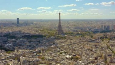 PARIS, FRANCE - MAY, 2019: Aerial drone view of Eiffel tower and historical city centre from above.