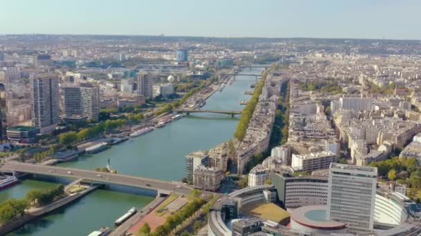 PARIS, FRANCE - MAY, 2019: Aerial drone view of the Seine riverside with bridges. — стокове відео