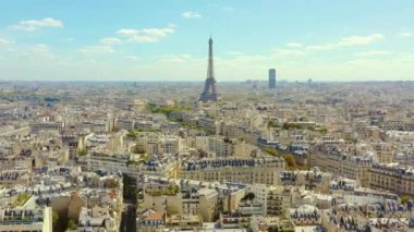 PARIS, FRANCE - MAY, 2019: Aerial drone view of Eiffel tower and historical city centre from above.