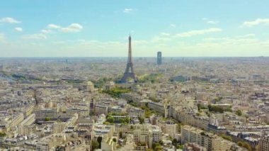 PARIS, FRANCE - MAY, 2019: Aerial drone view of Eiffel tower and historical city centre from above.