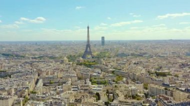 PARIS, FRANCE - MAY, 2019: Aerial drone view of Eiffel tower and historical city centre from above.