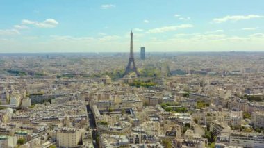 PARIS, FRANCE - MAY, 2019: Aerial drone view of Eiffel tower and historical city centre from above.