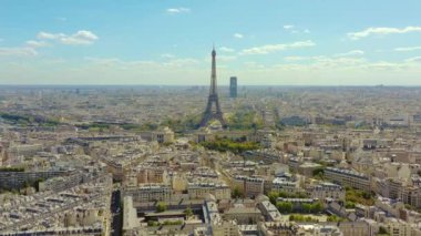 PARIS, FRANCE - MAY, 2019: Aerial drone view of Eiffel tower and historical city centre from above.