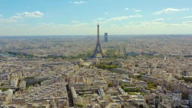 PARIS, FRANCE - MAY, 2019: Aerial drone view of Eiffel tower and historical city centre from above.