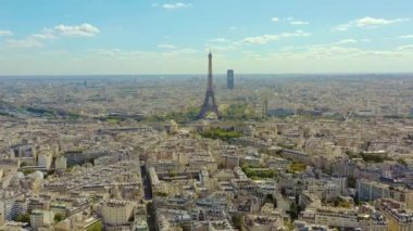 PARIS, FRANCE - MAY, 2019: Aerial drone view of Eiffel tower and historical city centre from above.