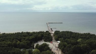 PALANGA, LITHUANIA - JULY, 2019: Aerial panorama view of the most popular street and bridge of Palanga with sea views.
