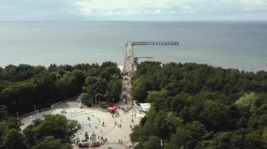 PALANGA, LITHUANIA - JULY, 2019: Aerial panorama view of the most popular street and bridge of Palanga with sea views.