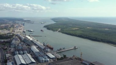 KLAIPEDA, LITHUANIA - JULY, 2019: Aerial panorama view of the port of Klaipeda and seascape of Baltic sea.