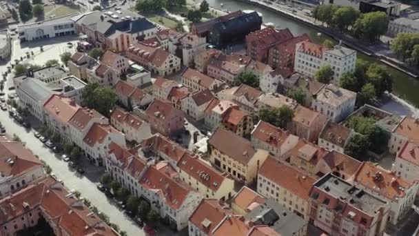 KLAIPEDA, LITHUANIA - JULY, 2019: Aerial panorama view of the old city centre of Klaipeda with Dane river shore. — стокове відео