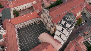 VILNIUS, LITHUANIA - JULY, 2019: Aerial view of the Bell tower of St. Johns church and courtyard of Vilnius University.