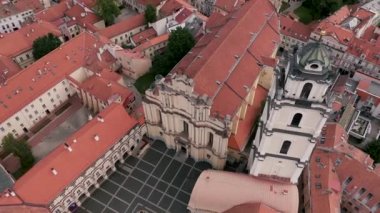 VILNIUS, LITHUANIA - JULY, 2019: Aerial view of the Bell tower of St. Johns church and courtyard of Vilnius University.