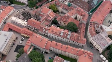 VILNIUS, LITHUANIA - JULY, 2019: Aerial panorama view of the roofs of houses in the old city centre of Vilnius.