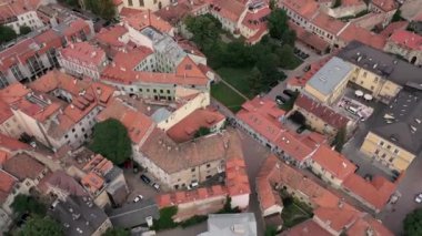 VILNIUS, LITHUANIA - JULY, 2019: Aerial panorama view of the roofs of houses in the old city centre of Vilnius.