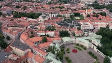 VILNIUS, LITHUANIA - JULY, 2019: Aerial view of the roofs of the old city centre and Presidential palace of Vilnius.