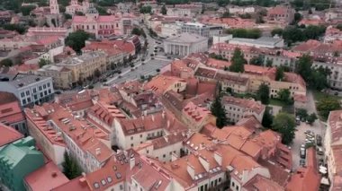 VILNIUS, LITHUANIA - JULY, 2019: Aerial drone view of the roofs of the old city centre and town hall square of Vilnius.
