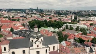 VILNIUS, LITHUANIA - JULY, 2019: Aerial view of the church of St. Spirit overlooking of the old city centre of Vilnius.