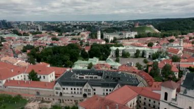 VILNIUS, LITHUANIA - JULY, 2019: Aerial view the old city with Bell tower, Presidential palace and castle mountain.